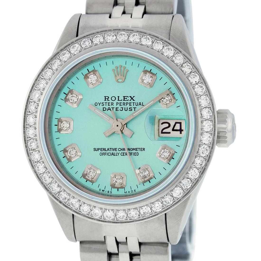 Rolex Ladies Datejust Watch Stainless Steel Ice Blue: Rolex Ladies Datejust 26mm Stainless Steel with Custom Ice Blue Dial set with aftermarket Diamond Hour Markers. Custom Stainless Steel Bezel with Genuine Round Diamonds. Rolex Automatic Movement with 