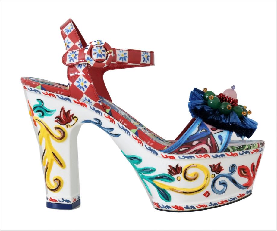 DOLCE & GABBANA MULTICOLOR HANDPAINTED CRYSTAL SANDALS: Brand: DOLCE & GABBANA Model: Ankle strap slide platform sandals Material: 18% Cotton, 27% PL, 55% PU Color: Multicolor Majolica pattern, hand-paintedÂ platforms and heels Sole: Leather