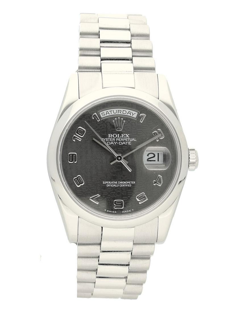 ROLEX PRE-OWNED ROLEX 36MM DAY-DATE PRESIDENT IN: Brand: Rolex Model: Oyster Perpetual Case Size: 36mm Movement: Automatic Complications: Day-Date Material: Platinum Band Material: Platinum Bracelet Box/Papers: Box