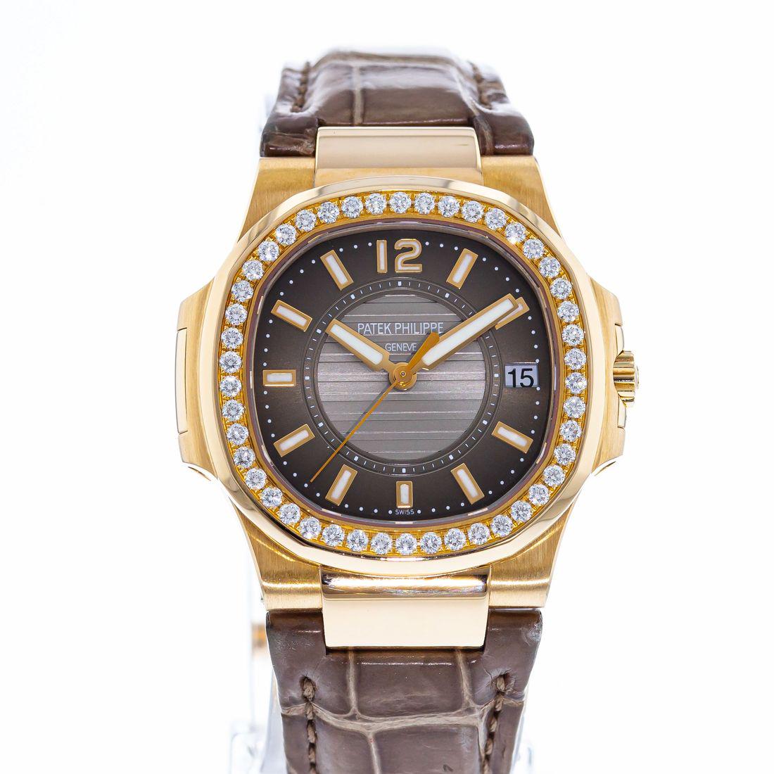 Patek Philippe Nautilus: Brand: Patek Philippe Model: Nautilus Case Size: 32mm Movement: Quartz Material: 18k Rose Gold Band Material: Leather Box/Papers: Box