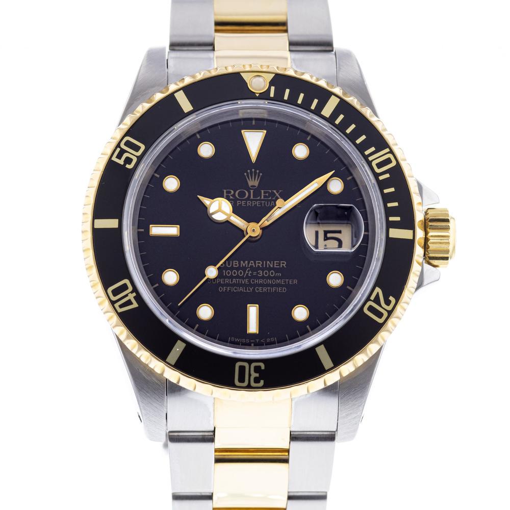 Rolex Submariner: Brand: Rolex Model: Submariner Case Size: 40mm Movement: Automatic Material: Stainless Steel Band Material: 18k Yellow Gold, Stainless Steel Box: No Papers: Yes