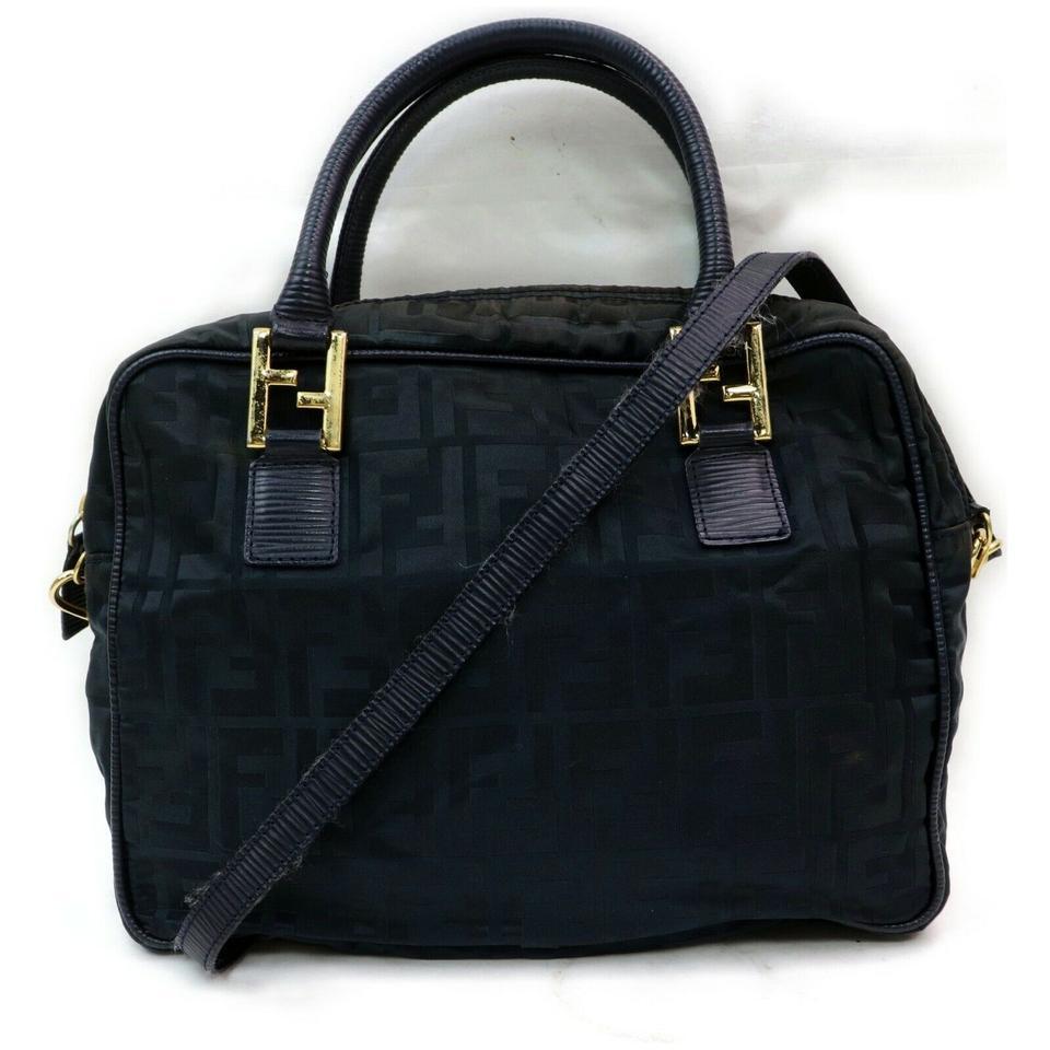Fendi Black Monogram FF Zucca Boston With Strap Dark: Brand: FENDIMaterial: Nylon Color: Dark Blue Strap: 30 cm Measurements: Width: 25 cm(approx) Height: 18 cm(approx) Depth: 7 cm(approx)