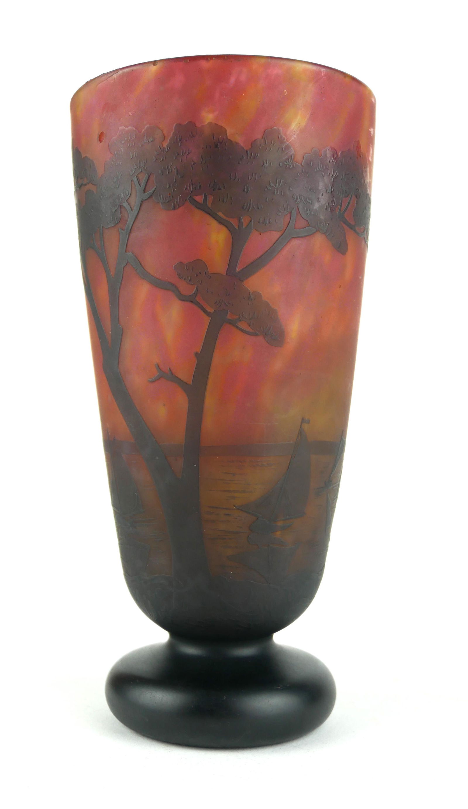 ATTRIBUTED TO NANCY DAUM, AN EARLY 20TH CENTURY: Description:ATTRIBUTED TO DAUM, NANCY, AN EARLY 20TH CENTURY TAPERING CAMEO GLASS SAILING BOATS VASE.