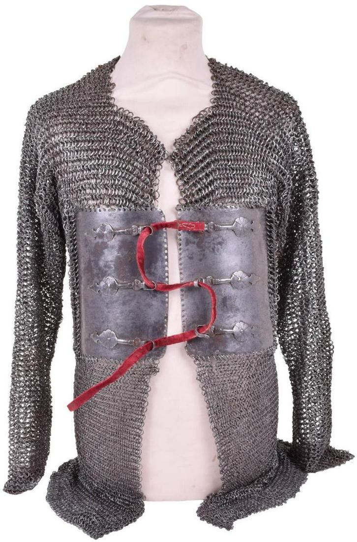17TH CENTURY OR EARLIER HEAVY INDIAN CHAINMAIL AND: Description: 17TH CENTURY OR EARLIER HEAVY INDIAN CHAINMAIL AND PLATE SHIRT Comprising a pair of slightly curved front plates fitted with shaped buckles, the inside of one engraved with The Adoni insc