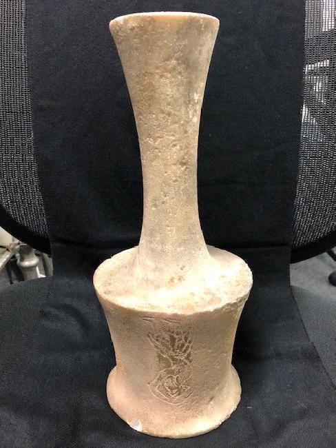 LARGE IDOL WITH ENGRAVING: Description: Large Idol Stone possibly alabaster or Marble, with engraving at bottom section, 32 CM Height. Location: Beverly Hills, CA