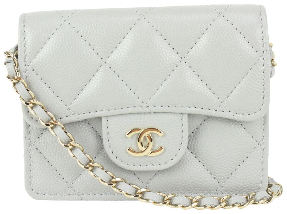Chanel Light Grey Caviar Nano Micro Mini Classic Flap: Brand: CHANEL Strap: 21" Measurements: Length: 4" Width: 1" Height: 3"