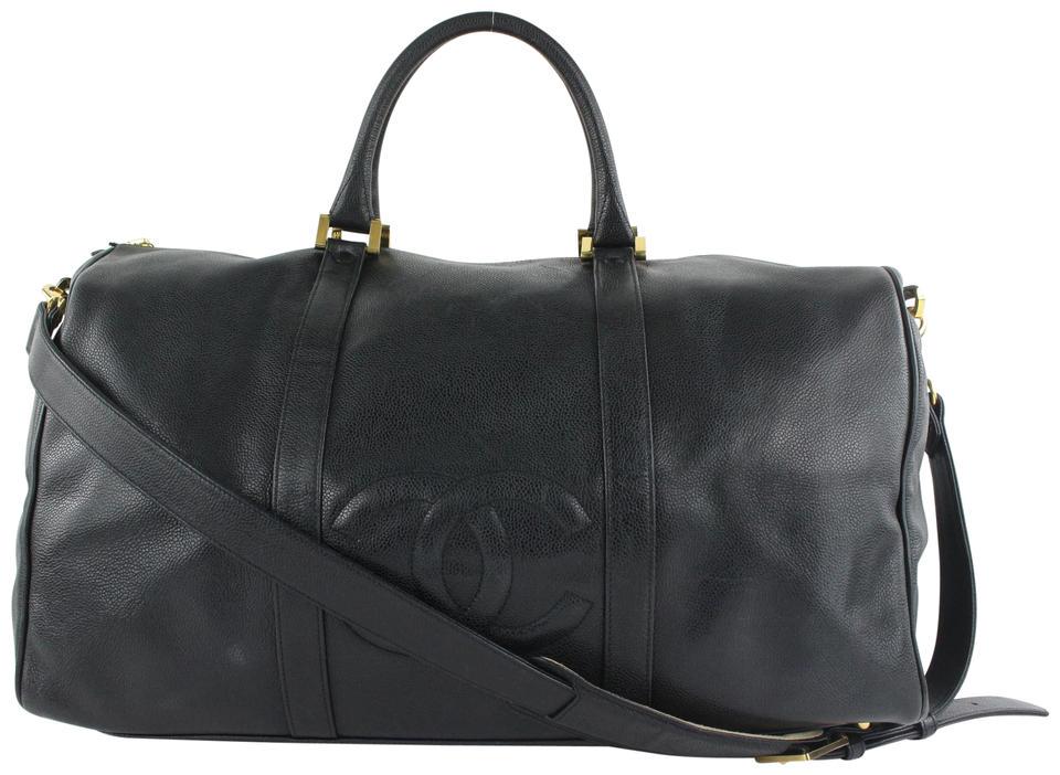 Chanel Timeless Black Caviar Leather CC Boston Duffle: Brand: CHANEL Strap: 18.5" Measurements: Length: 19.5" Width: 9" Height: 11.5"