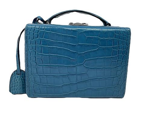 MARK CROSS BLUE ALLIGATOR GRACE BOX CROSSBODY: Brand: MARK CROSS Measurements: 7.25"W x 5.5"H x 3.5"D 2" handle drop 19.5" - 23.5" strap drop Condition: LIKE NEW Shipping: Ships From US Facilities (NY Elizabeth has facilities in the United States,