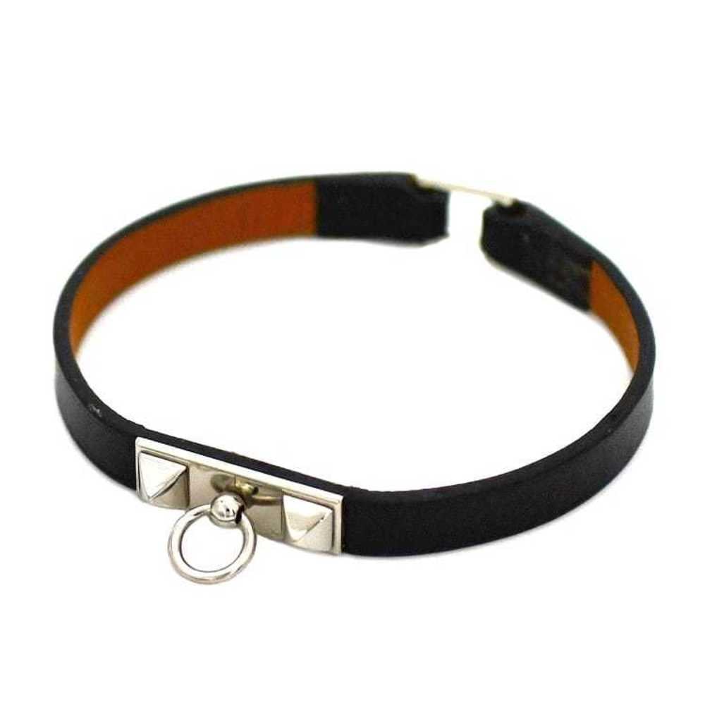 HERMES BRACELET RIVAL DOUBLE: Brand: Hermes Type: Charm bracelet Material: Leather, Metal, Togo leather Length: 19.5cm / 7.67''
