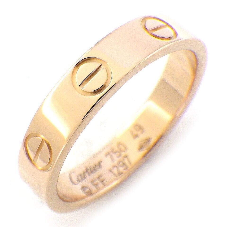 CARTIER RING LOVE WEDDING: Brand: CartierMaterial: 750(18K) Rose(Pink) Gold US Size: 5 Width: 0.13"(inches) / 3.5mm Weight: 3.5 grams Accessories: Jewelry Box