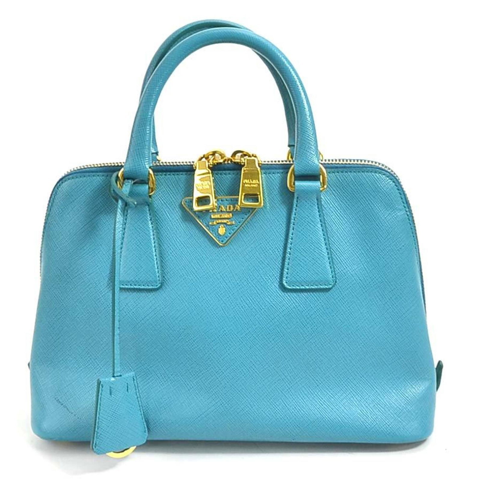 Prada handbag leather blue: Prada handbag leather blue Brand: Prada Country of Origin: Italy Type: Handbag Material: Leather Color: Blue Hardware Color: Gold Closure: Zipper Inner Pocket: Zipper pocket
