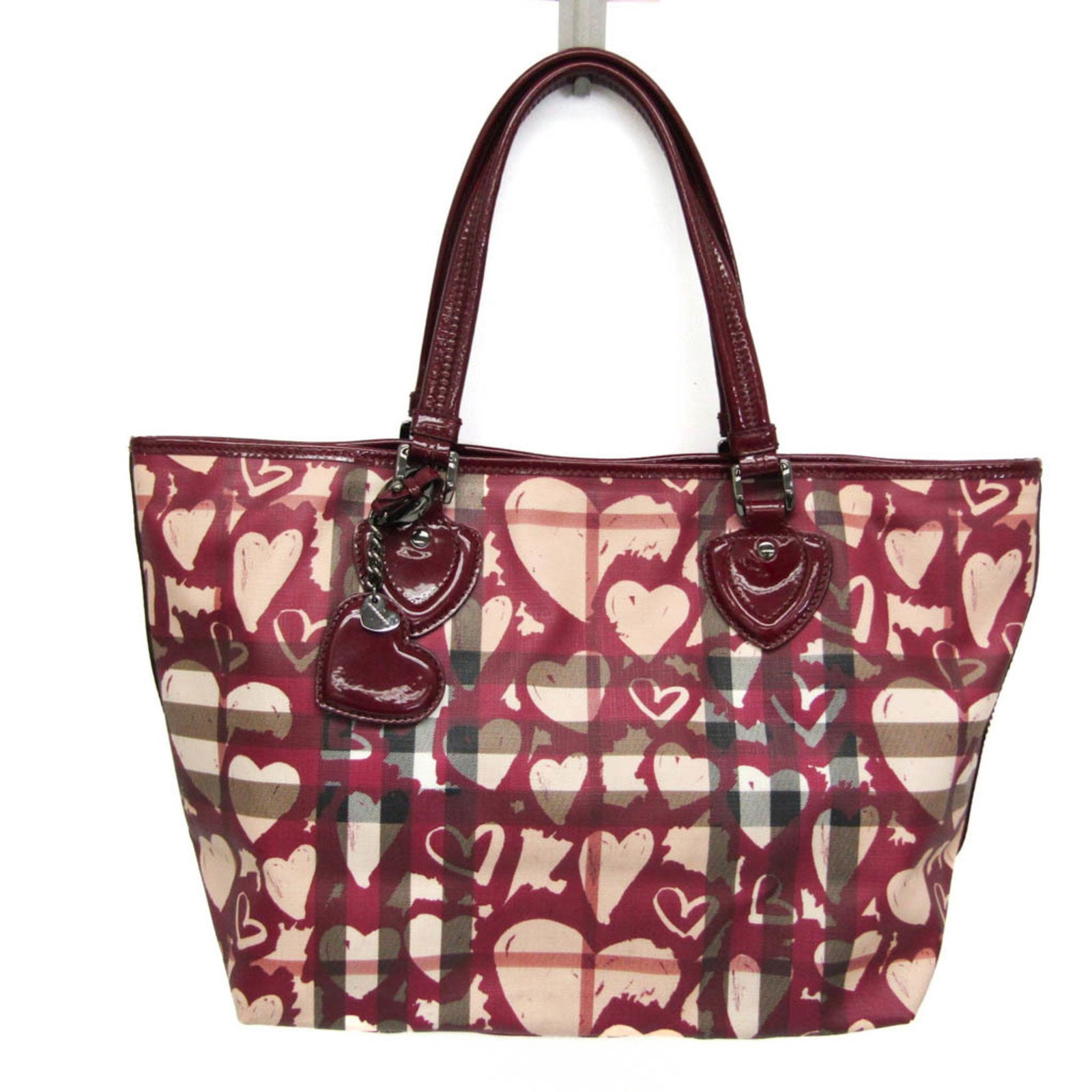 Burberry Heart Pattern PVC Leather: Burberry Heart Pattern PVC Leather Brand: Burberry Model: heart pattern Country of Origin: Romania Type: Tote bag Material: PVC Leather Leather/Fur Type: Patent leather Color: Be