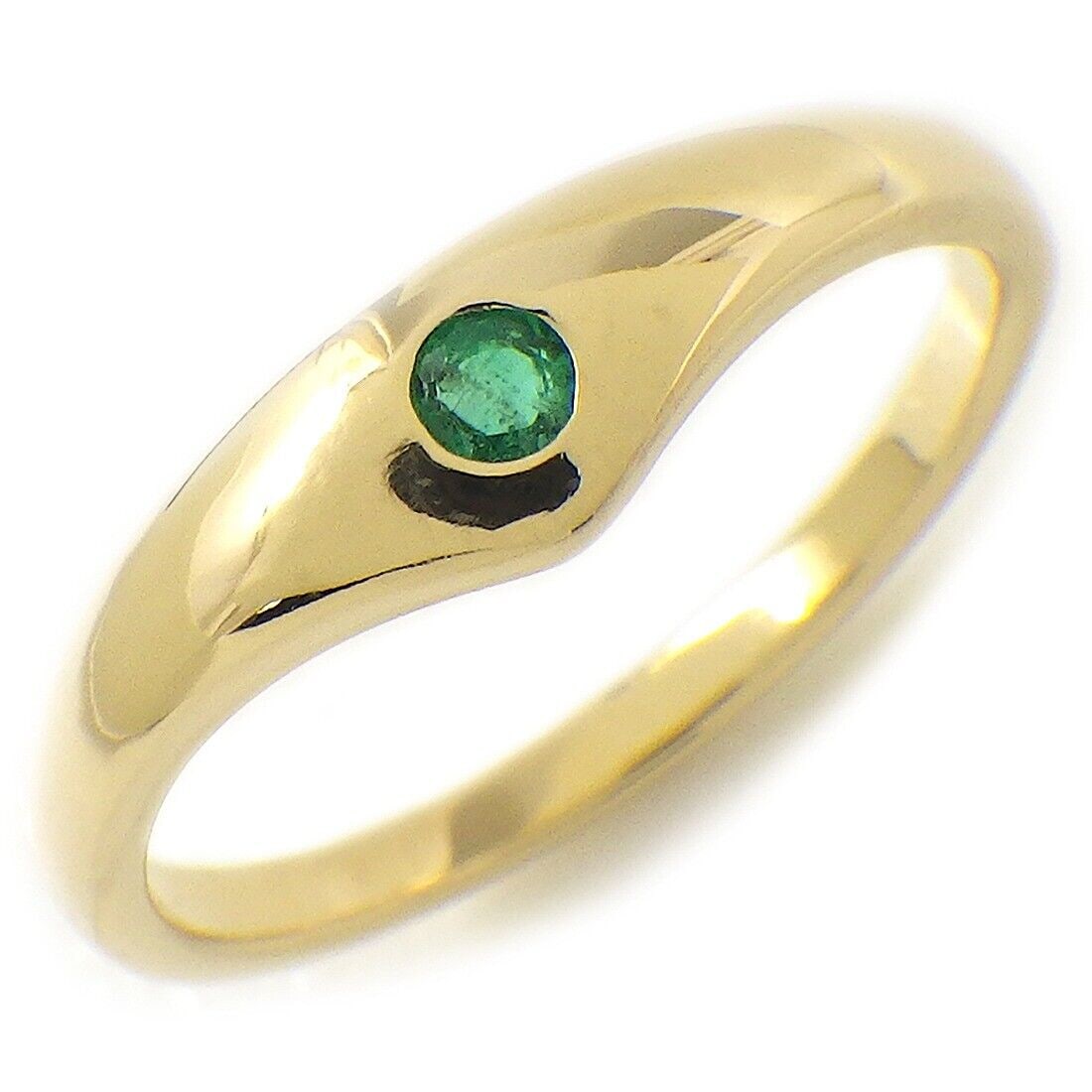 TIFFANY & CO. CURVED V EMERALD 18K YELLOW GOLD RING: Brand: Tiffany & Co. Type: Ring Material: 18K Yellow Gold Stone: Emerald Stone Diameter: 0.07" / 2.0mm Ring Size: 4.75 (US) Ring Width: 0.06"-0.16" / 1.7mm - 4.3mm Weight: 2.3 grams Accessories: Jewel