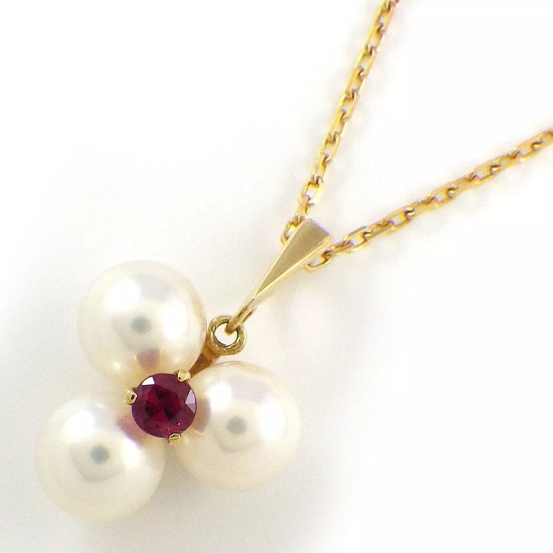 MIKIMOTO PEARL & RUBY 18K YELLOW GOLD NECKLACE: Brand: Mikimoto Type: Necklace Material: 18K Yellow Gold Stone: Pearl & Ruby Pearl Diameter: 0.24" / 6.2mm Chain Length: 15.66" / 39.8cm Pendant Size: W 0.51" × H 0.74"/ W 13.0mm × H 19.0mm Weight: