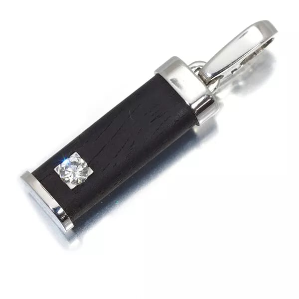 CARTIER PENDANT DIAMOND CHARM 18K 750 WHITE GOLD/WOOD: Cartier Pendant Diamond Charm 18K 750 White Gold/Wood Brand: Cartier Type: Pendant Material: 18K/750/White Gold, Wood Color: None Size: 23.2 x 8.7mm Accessories: None Accessories Notice: