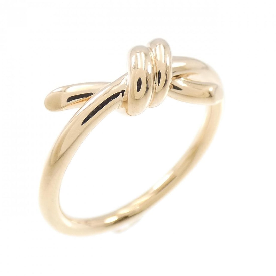 TIFFANY KNOT RING: Tiffany Knot Ring Brand: Tiffany Type: Ring Material: 750 Pink Gold Color: None Size: 4-4.5 Accessories: None Accessories Notice: When purchasing pre-owned goods, please refer to the phot