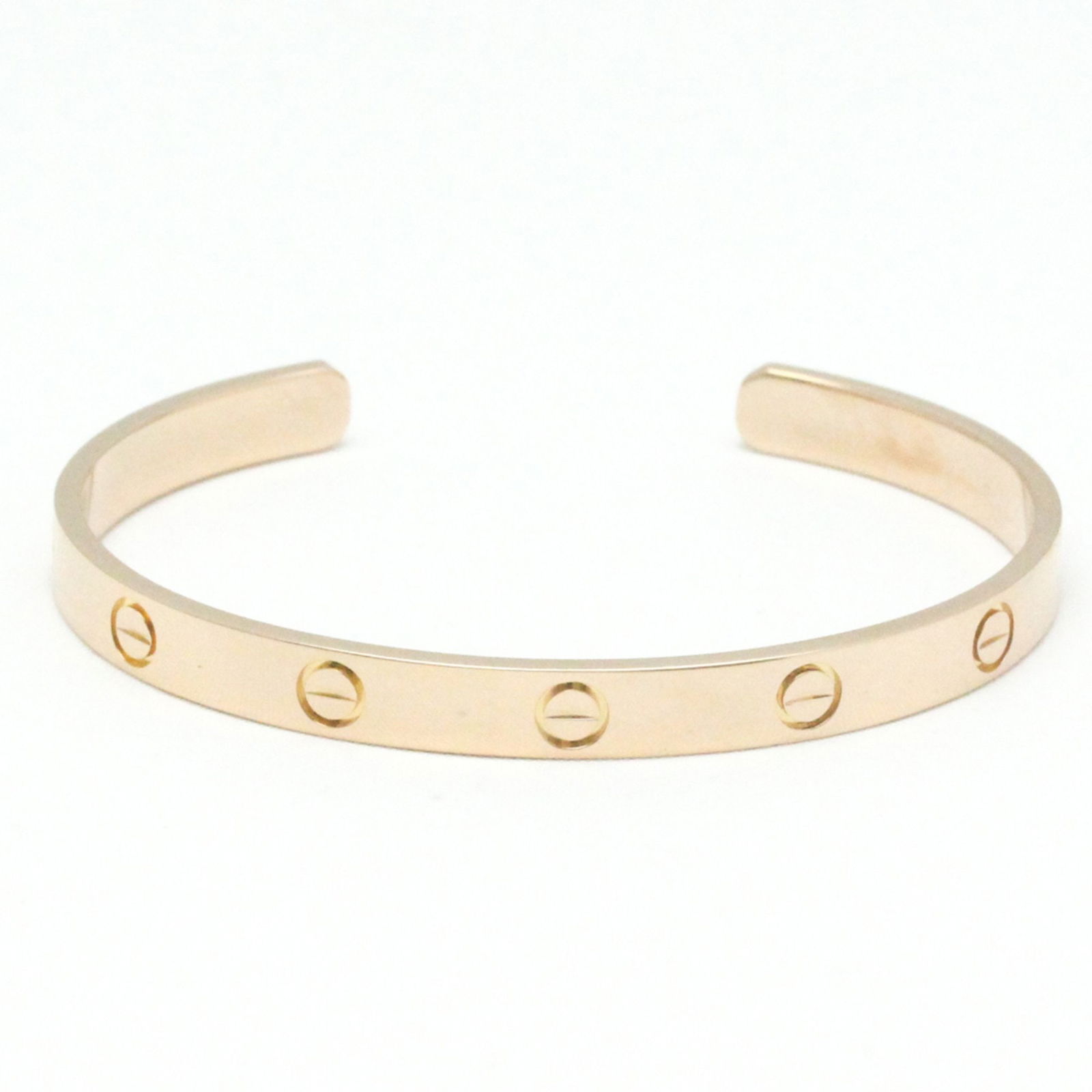 CARTIER LOVE BRACELET OPEN BANGLE PINK GOLD: Cartier Love Bracelet Open Bangle Pink Gold Brand: Cartier Type: Bangle Material: Pink gold (18K) Color: Pink gold Size: 18 Accessories: None Accessories Notice: When purchasing pre-owned