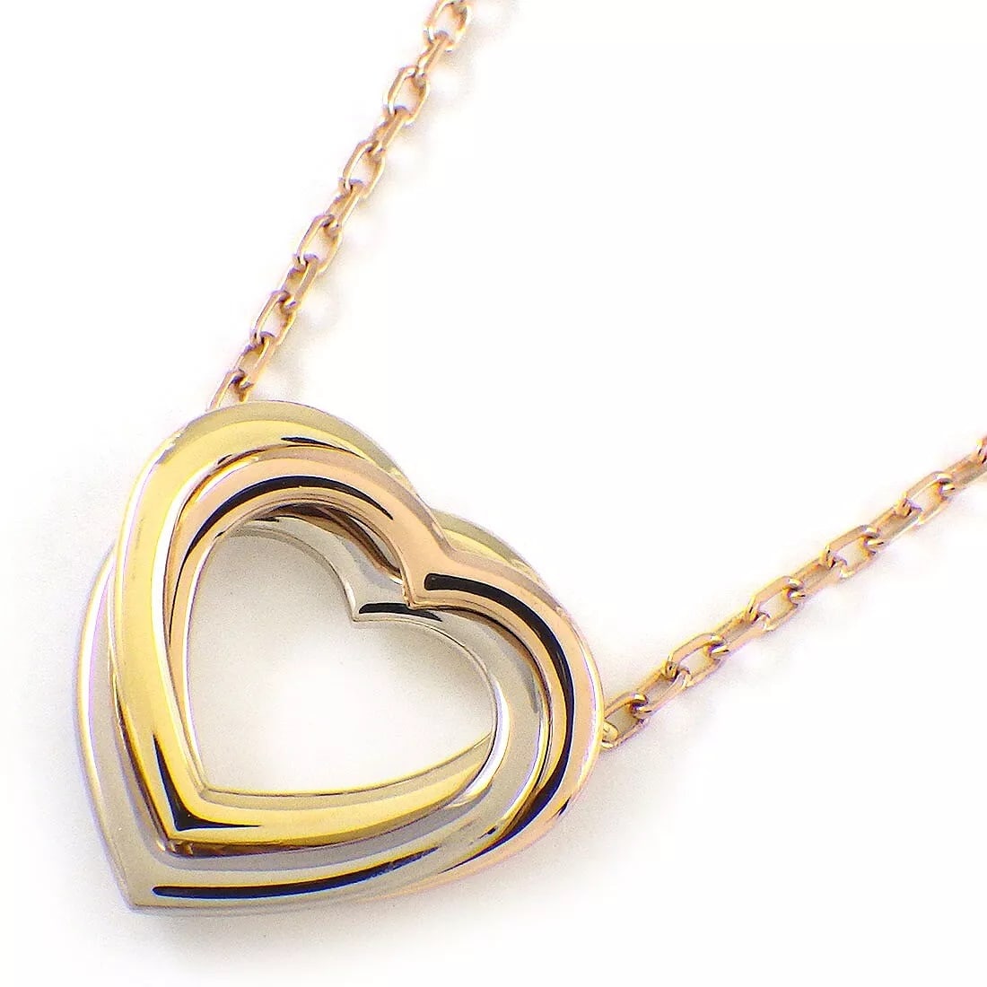 Cartier Necklace Trinity Heart: Cartier Necklace Trinity Heart Brand: Cartier Type: Necklace Material: 750(18K) Tri-Color Gold Color: None Size: Chain Length : 15.03" & 16.25"(inches) / 38.2cm & 41.3cm Accessories: None