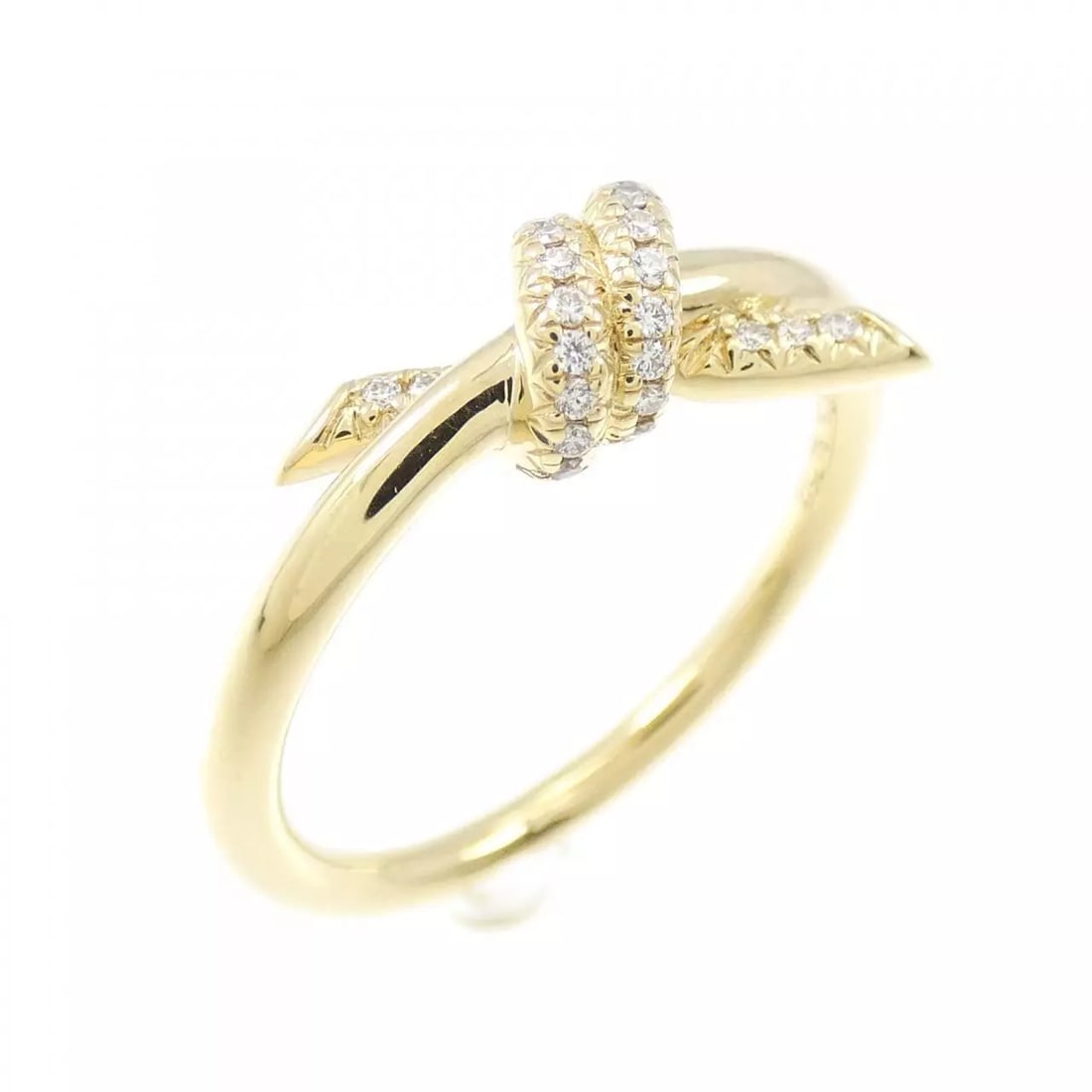 TIFFANY KNOT RING: Tiffany Knot Ring Brand: Tiffany Type: Ring Material: 750 Yellow Gold Color: None Size: 4.5-5 Accessories: None Accessories Notice: When purchasing pre-owned goods, please refer to the ph