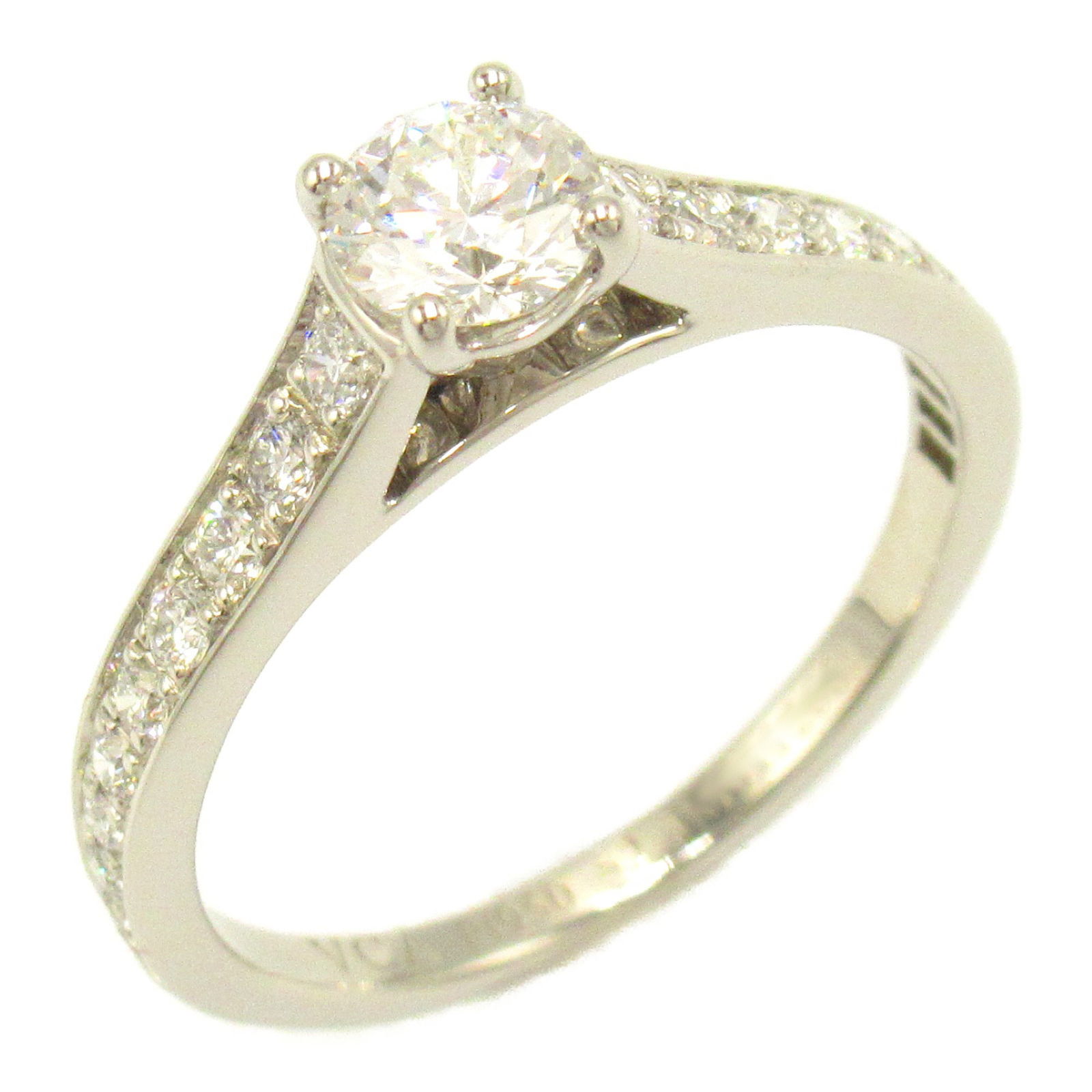 VAN CLEEF & ARPELS ROMANCE SOLITAIRE RING: Van Cleef & Arpels Romance Solitaire Ring Brand: Van Cleef & Arpels Type: Band ring Material: Platinum Color: Other Size: 5.75 - 6 Accessories: None Accessories Notice: When purchasing pr