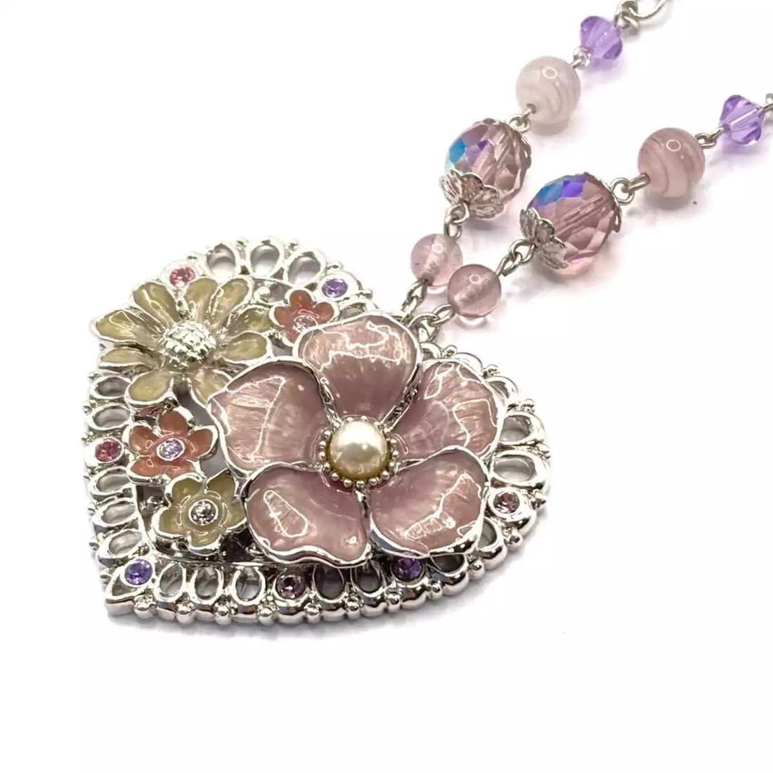 ANNA SUI - SILVER LIGHT PINK MULTI NECKLACE: ANNA SUI - Silver Light Pink Multi Necklace Brand: ANNA SUI Type: Necklace Material: Hardware, Plastic, Fake Pearl Color: Silver, Light Pink, Multi Size: Top: 1.93 inch (4.9 cm), * 2.05 inch (5.2