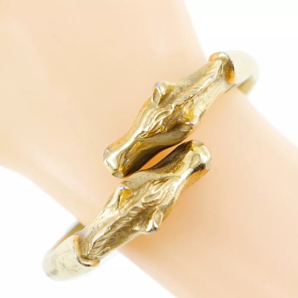 HERMES CHEVAL HORSE BANGLE PLATED GOLD: HERMES Cheval Horse Bangle Plated Gold Brand: HERMES Type: Bangle Material: Plated Gold Color: Gold Size: Wrist circumference?20.5cm Bracelet width?0.7cm Accessories: None Accessories Not