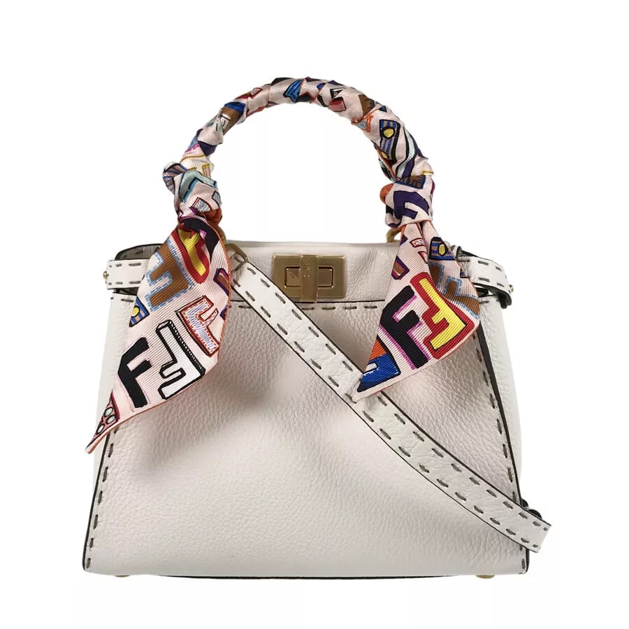 FENDI PEEKABOO MINI SELLERIA HAND BAG: FENDI Peekaboo Mini Selleria Hand bag Brand: FENDI Type: Hand bag Material: leather Color: White Size: W: 9.3" H: 7.3" D: 4.5" Handle: 10.2" Shoulder strap: 51.8" Accessories: None Access