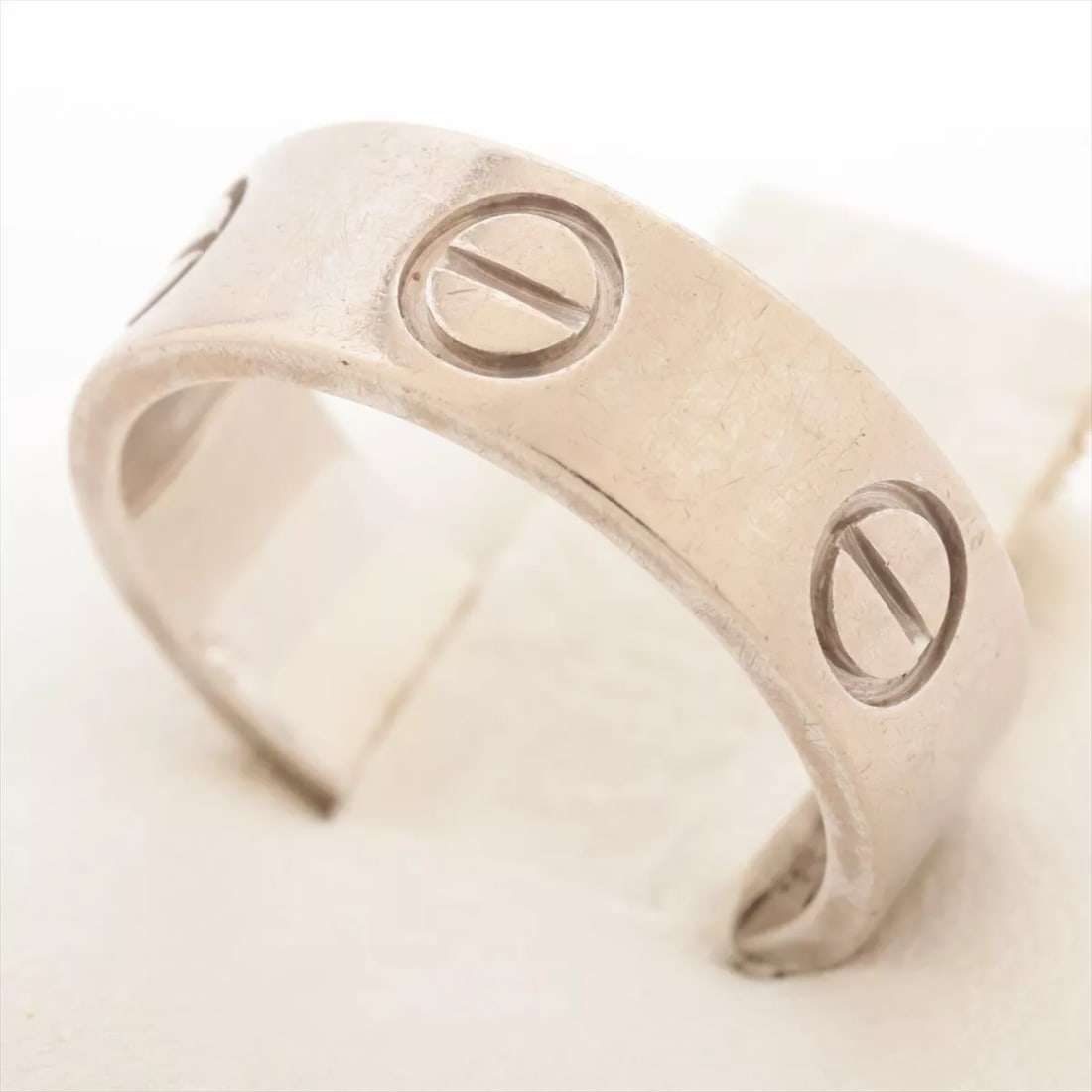 CARTIER LOVE RING 750(WG): Cartier Love Ring 750(WG) Brand: Cartier Type: Ring Material: See description Color: Not Specified Size: 3.75 Accessories: None Accessories Notice: When purchasing pre-owned goods, please