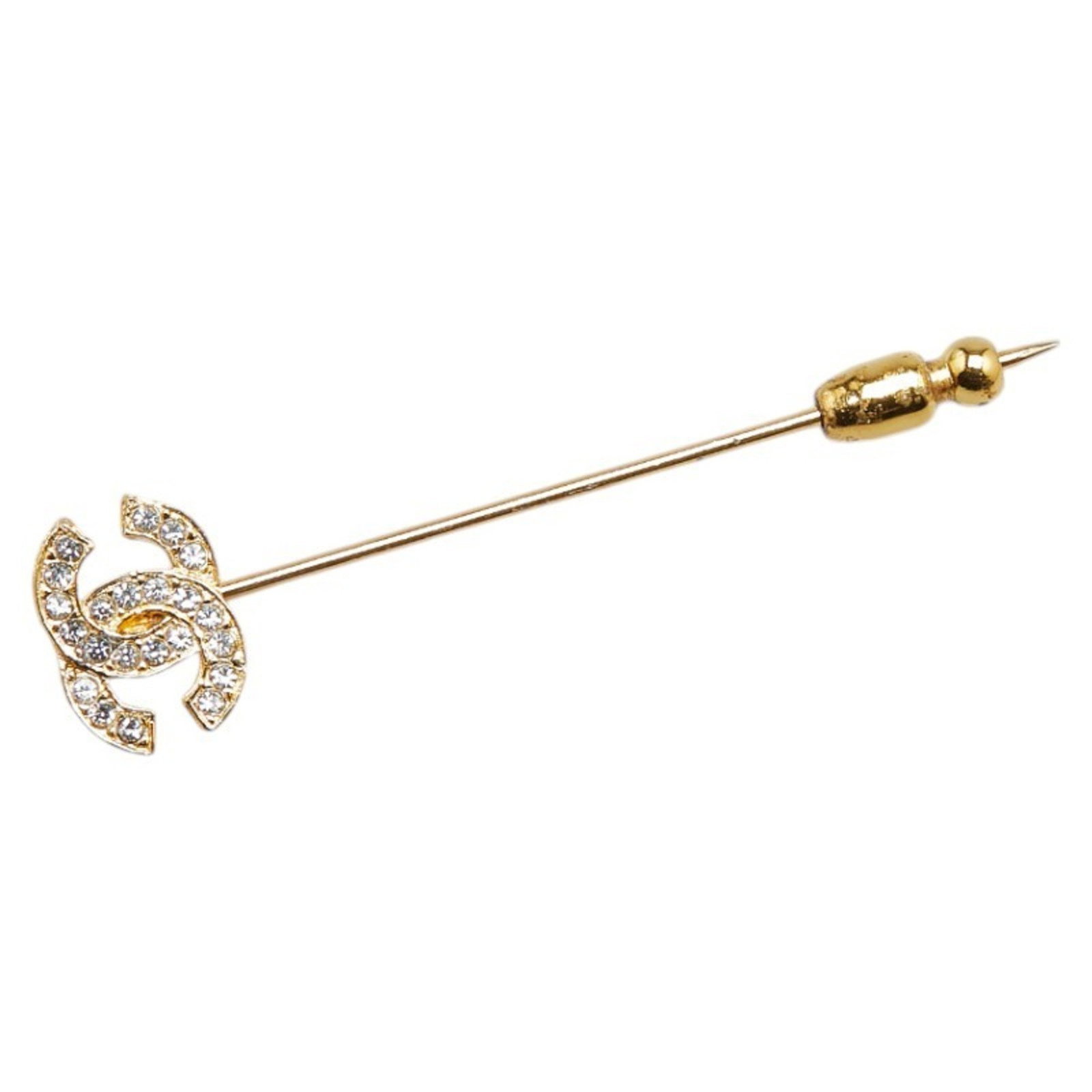 CHANEL COCO MARK RHINESTONE BROOCH GOLD PLATED: CHANEL Coco Mark Rhinestone Brooch Gold Plated Brand: Chanel Type: Brooch Material: None Color: Gold Size: (HxWxD)5.72cm x 1.31cm / 2.25'' x 0.51'' Accessories: None Accessories Notice: W
