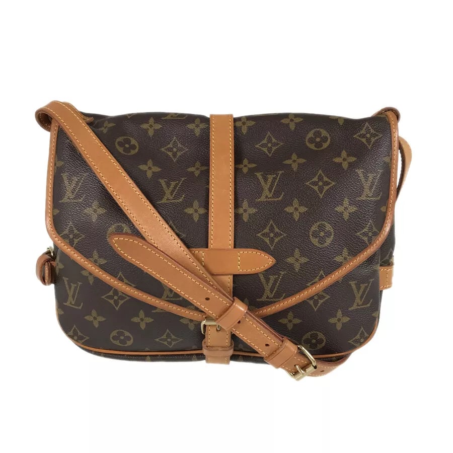 LOUIS VUITTON MONOGRAM SAUMUR SHOULDER BAG: LOUIS VUITTON Monogram Saumur Shoulder bag Brand: Louis Vuitton Type: Shoulder bag Material: PVC Color: Brown Size: W: 11.8" H: 7.9" D: 3.1" Shoulder strap: 47.2" Accessories: None Access