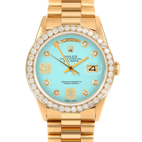 ROLEX DAY-DATE 36MM CUSTOM TURQUOISE DIAMOND WITH DIAMOND ARABIC 6 & 9 PRESIDENT CUSTOM: Rolex Day-Date 36mm Custom Turquoise Diamond with Diamond Arabic 6 & 9 President Custom Brand: Rolex Day-Date Type: Watch Material: Yellow Gold Color: Dial Turquoise Size: Case Size: 36 mm Access