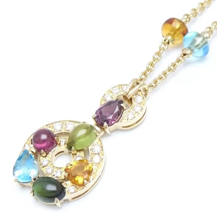 BVLGARI ASTRALE CHERKI 18K YELLOW GOLD NECKLACE: BVLGARI Astrale Cherki 18K Yellow Gold Necklace Brand: BVLGARI Type: Necklace Material: 18K Yellow Gold Color: None Size: [Chain Length] 14.6?17.7 inches (37?45cm) [Top] 1.3 x 0.8 inches (32mm x 1