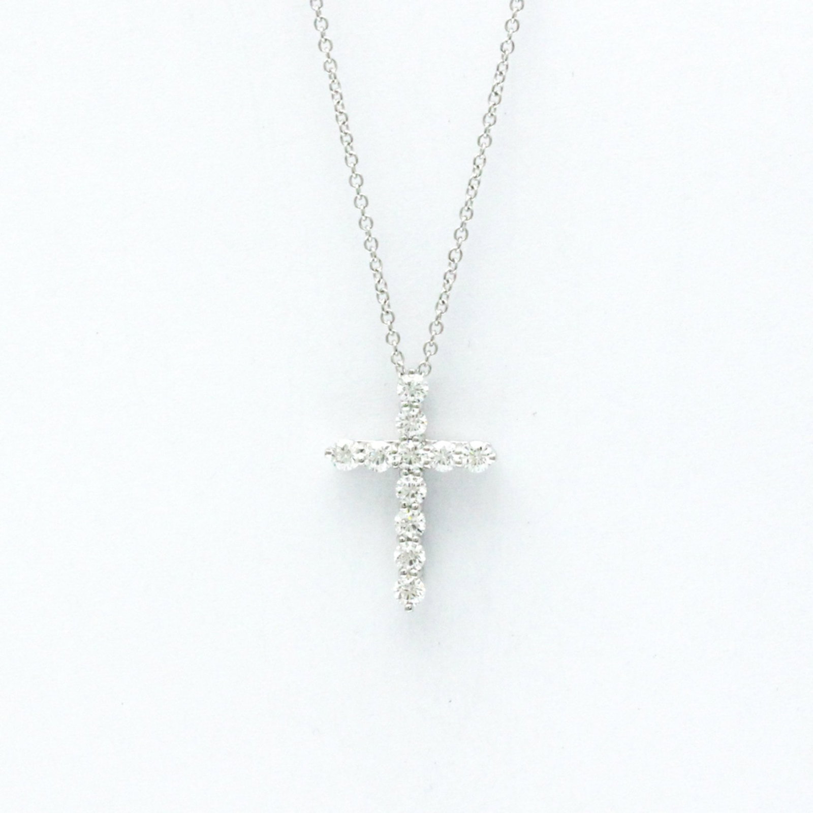TIFFANY SMALL CROSS DIAMOND NECKLACE PENDANT NECKLACE: Tiffany Small Cross Diamond Necklace Pendant Necklace Brand: Tiffany Type: Pendant necklace Material: Platinum Color: Silver Size: Neck Circumference: 40.5 cm / 15.94'' Pendant Size: 18.5mm x 13mm / 0
