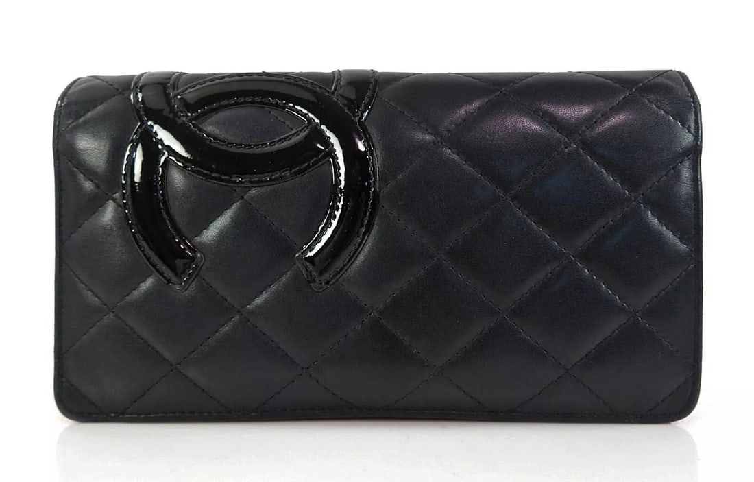 CHANEL BLACK LEATHER CAMBON LINE WALLET COIN PURSE: CHANEL Black Leather Cambon Line Wallet Coin Purse Brand: CHANEL Type: Clutch Material: Leather Color: Black Size: Size in inches (approx.):W 7.1 x H 3.9 x D 0.8 Accessories: None Accessor