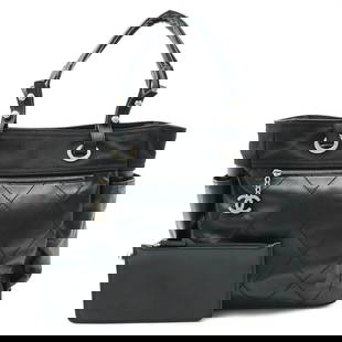 CHANEL PARIS BIARRITZ GM LEATHER BLACK WITH POUCH TOTE BAG: Chanel Paris Biarritz GM Leather Black with Pouch Tote Bag Brand: CHANEL Type: Tote Bag Material: Leather Color: Black Size: Bag Width 14.11 in Bag Height 11.27 in Accessories: None