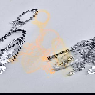 LOUIS VUITTON LOCK & KEY WITH UNBRANDED BAGCHARM: Louis Vuitton Lock & Key with unbranded Bagcharm Brand: Louis Vuitton Type: Key Chain Material: NOne Color: Multicolor Size: None Accessories: None Accessories Notice: When purchasing