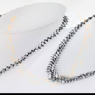 FRENCH 18K YELLOW AND WHITE GOLD DIAMOND NECKLACE: French 18K Yellow And White Gold Diamond Necklace Metal Type: 18K Yellow Gold  Condition: Excellent  Size: 16-inch  Description: This French-made diamond necklace is a true masterpiece, featuring a st