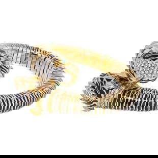 DAVID WEBB PLATINUM & 18K YELLOW GOLD BRACELET: David Webb Platinum & 18K Yellow Gold Bracelet Metal Type: Platinum & 18K Yellow Gold  Condition: Excellent  Size: Measurements: Circumference: 6 inches  Description: Embrace the wild elegance of the