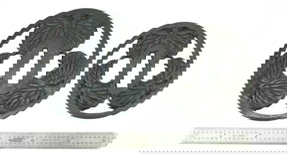 IRON DAI-SHO TSUBA (MGJ300): Iron Dai-Sho Tsuba (MGJ300) Description: Iron Dai-Sho Tsuba. Sukashi with Blossoms. Comes with custom box.  Size: Length 3 inches  Accessories: None Accessories Notice: When purchasing pre-owned goods