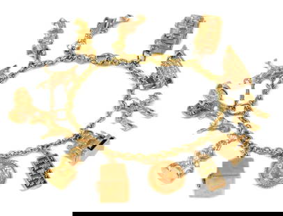 VINTAGE 18K & 14K YELLOW GOLD CHAIN BRACELET: Vintage 18k & 14k Yellow Gold Chain Bracelet Brand: Unbranded  Type: Bracelet charms  Material: 18k gold bracelet & 14k yellow gold charms  Color: None  Size: Measurement: 7" long x 0.15" wide x 0.15"