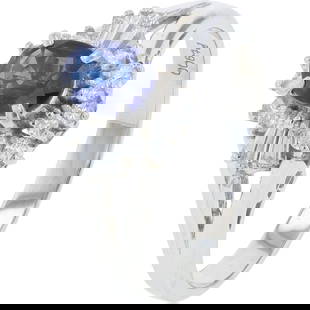 PLATINUM OVAL SAPPHIRE AND DIAMOND HALO RING: Platinum Oval Sapphire and Diamond Halo Ring Brand: Estate (Estate / Vintage)  Product Type : Ring  Material: Metal Type: Platinum 900  Sone Color: None  Stone Shape: None  Gemstone(s): Sapphire , Dia