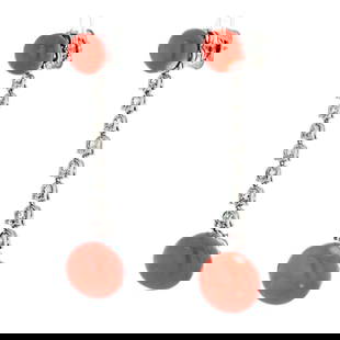PLATINUM CORAL DIAMOND DROP EARRINGS: Platinum Coral Diamond Drop Earrings Metal Type: Platinum  Condition: Excellent  Size: Measurements: L: 69mm  Description: Introducing a mesmerizing pair of Estate Diamond and Coral Drop Earrings, a t
