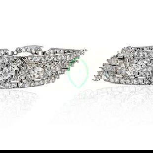 PLATINUM ART DECO DIAMOND AND GREEN BRACELET: Platinum Art Deco Diamond And Green Bracelet Metal Type: Platinum Condition: Excellent Size: Measurements: L: 7 inches Description: Elevate your jewelry collection with the timeless elegance of thi