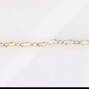 BAGUETTE CUT DIAMOND TENNIS BRACELET: Baguette Cut Diamond Tennis Bracelet Brand: Unbranded  Type: Bracelet  Material: Metal Yellow Gold  Color: Diamond Color Grade: G, Clarity Diamond Clarity Grade: VS2 - SI2  Size: Bracelet Measurement: