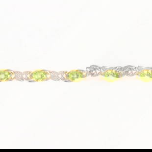 OVAL PERIDOT & DIAMOND XO BRACELET 14K MULTI- TONE GOLD: Oval Peridot & Diamond XO Bracelet 14k Multi- Tone Gold Brand: Unbranded  Type: Bracelet  Material: Metal Multi- Tone Gold  Color: Main Stone Color: Light Yellowish Green, Clarity Gemstone Clarity Gra