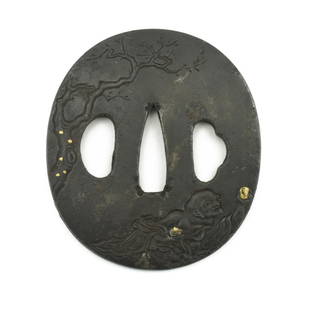 IRON TSUBA: Iron Tsuba Description: Iron Tsuba. Mythical character carrying Pearl of Wisdom under a tree with gold highlights.M Vertical height 2 13/16&rdquo; (7.2 cm).  Size: Vertical height 2 13/16&rdquo; (7.2