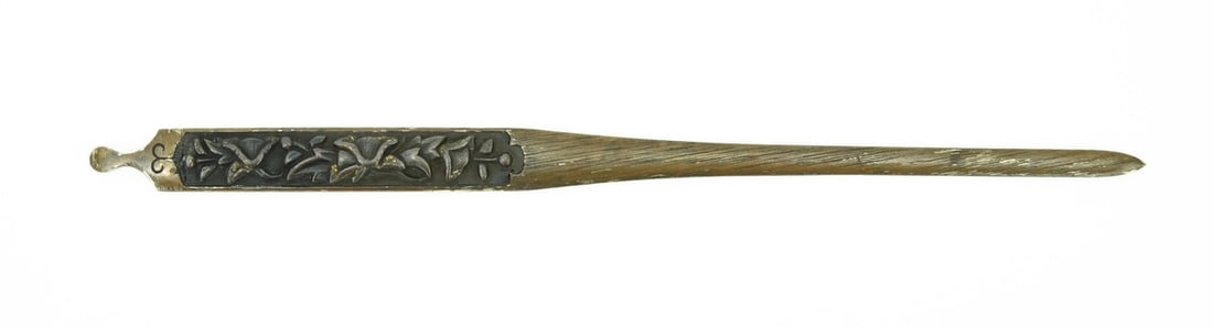 KINKO KOGAI: Kinko Kogai Description: Kinko Kogai. Subject matter is deeply carved designs against Shakudo ground. Body of Kogai is copper with traces of silver plate remaining. Signed: Goto Mitsu Mori (Goto Keijo