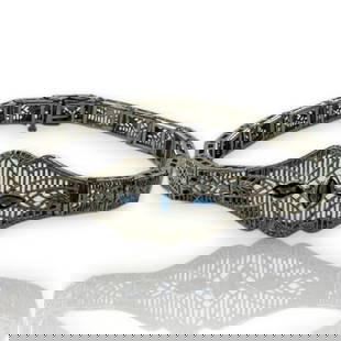 FILIGREE OPENWORK BRACELET SAPPHIRES: Filigree Openwork Bracelet Sapphires Brand: Unbranded  Type: Bracelet  Material: Metal  Color: White  Size: Length - 6.5" Width - 12.5mm  Accessories: None Accessories Notice: When purchasing p