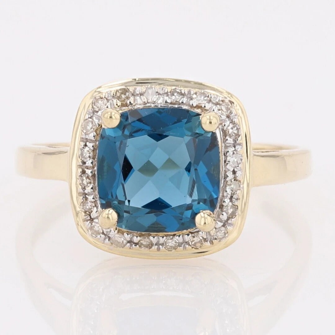 BLUE TOPAZ AND DIAMOND HALO STATEMENT RING 14K YELLOW: Blue Topaz and Diamond Halo Statement Ring 14k Yellow Brand: Unbranded Type: Ring Material: Yellow Gold Color: None Size: 7 US Accessories: None Accessories Notice: When purchasing pre-own