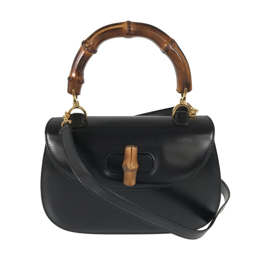 GUCCI BAMBOO HAND BAG: GUCCI Bamboo Hand bag Brand: GUCCI Type: Hand bag Material: Leather Bamboo Color: Black Size: W:9.1" H:6.9" D:3.1" Handle:14.6" Shoulder strap:40" Accessories: None Accessories Notice: Whe